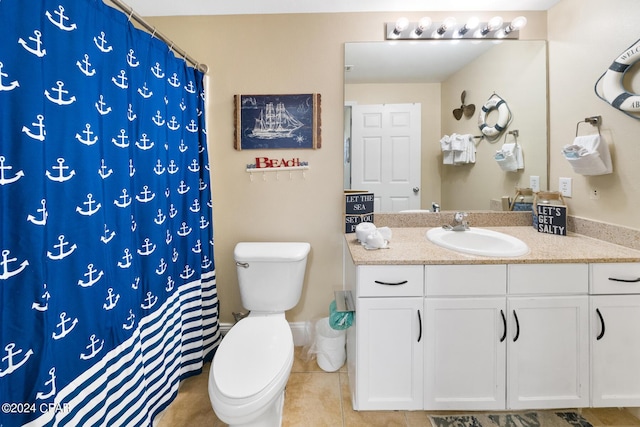 full bathroom with a shower with curtain, toilet, vanity, and tile patterned flooring