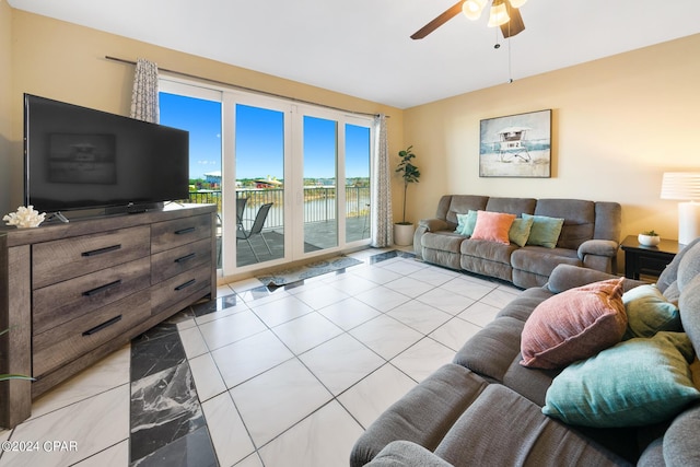 living room featuring light tile patterned flooring and a ceiling fan