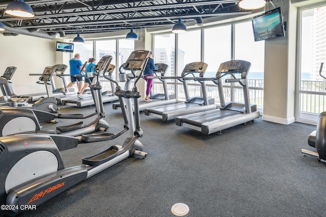 exercise room with baseboards