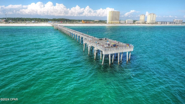 aerial view with a pier, a view of city, and a water view