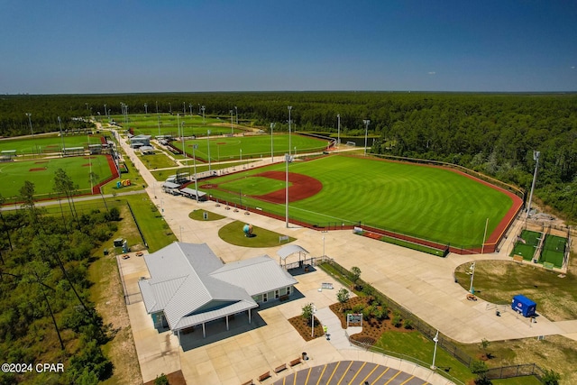 bird's eye view featuring a wooded view