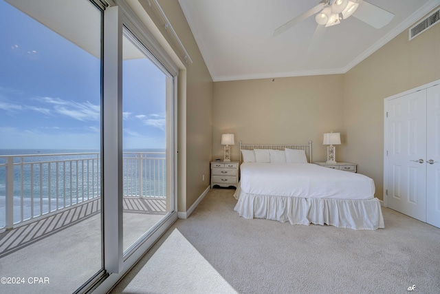 bedroom with a water view, access to exterior, carpet flooring, visible vents, and crown molding