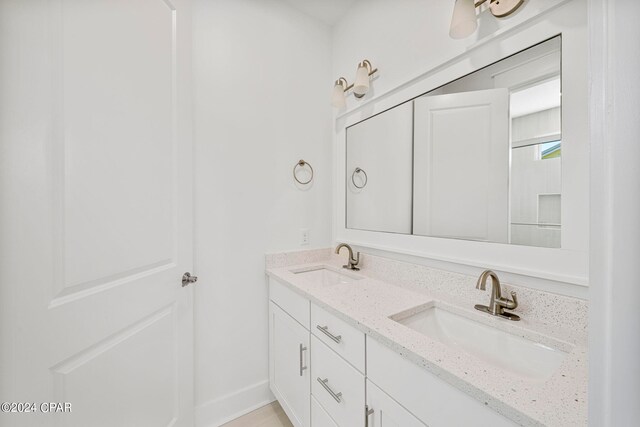 bathroom with double vanity