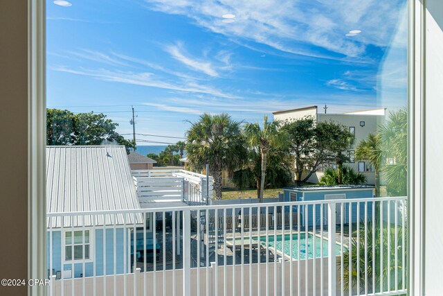 exterior space featuring a fenced in pool