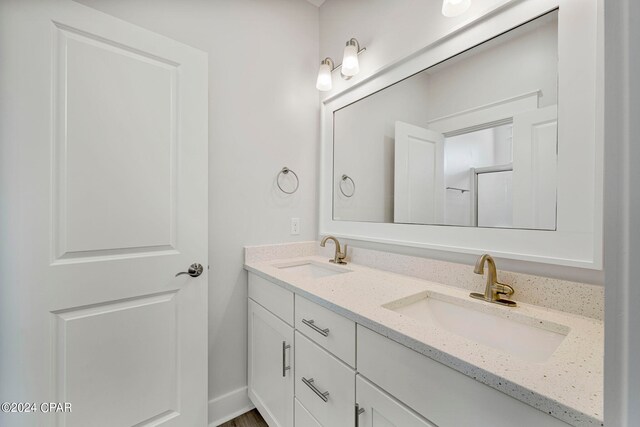 bathroom with double vanity