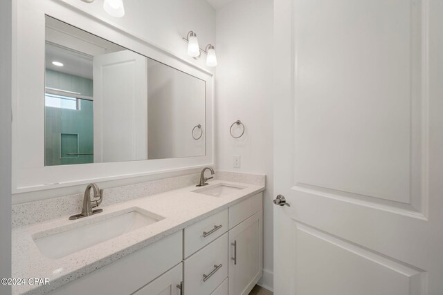 bathroom featuring double vanity