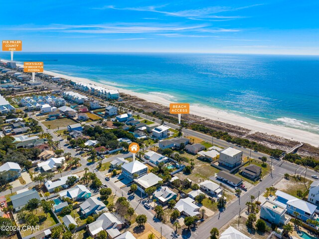 aerial view with a beach view and a water view