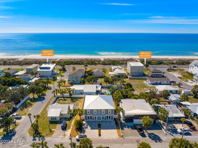 bird's eye view with a water view and a view of the beach