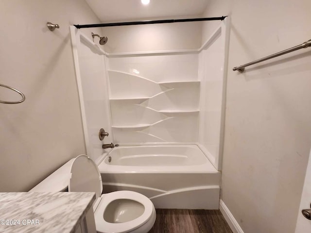 full bathroom featuring vanity, shower / bathtub combination, toilet, and hardwood / wood-style flooring