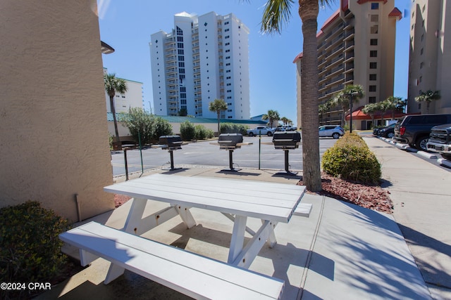 view of home's community featuring a patio area