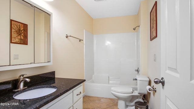 full bathroom featuring vanity, toilet, and bathing tub / shower combination