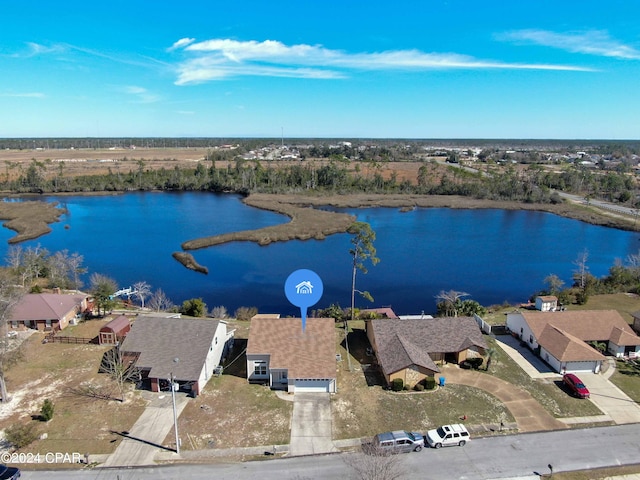 drone / aerial view with a water view