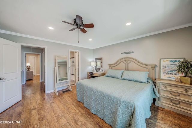 bedroom featuring ornamental molding, ceiling fan, and light hardwood / wood-style flooring