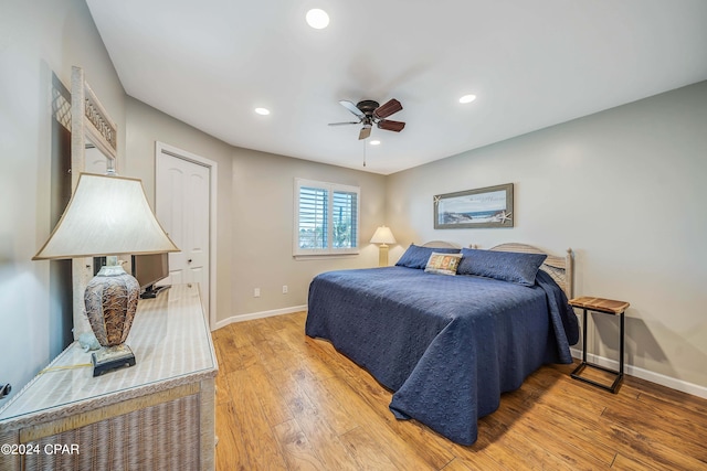 bedroom featuring ceiling fan and light wood-type flooring