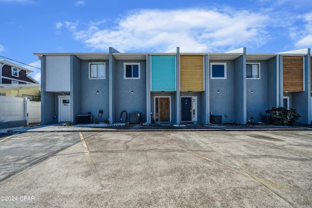 view of property with central AC unit