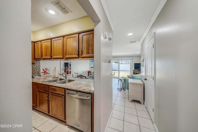 kitchen with dishwasher, ornamental molding, light tile patterned flooring, and sink