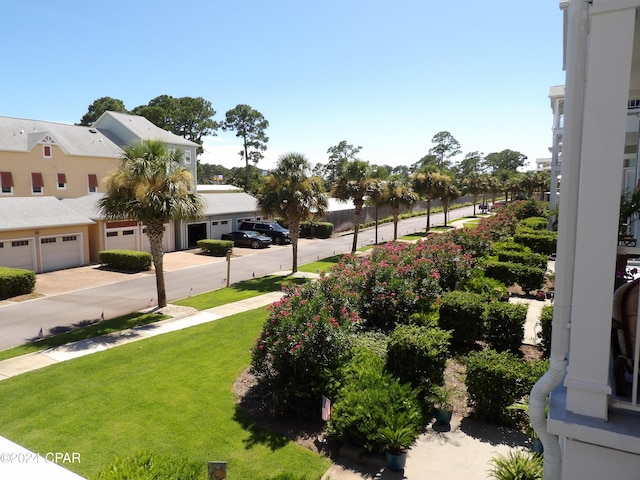 view of yard with a garage