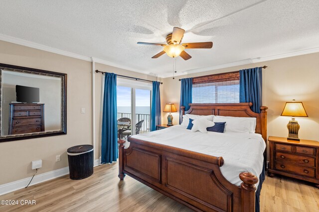 bedroom featuring a textured ceiling, access to exterior, ceiling fan, and light wood-type flooring