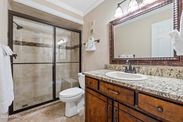 bathroom with an enclosed shower, vanity, tile floors, toilet, and crown molding