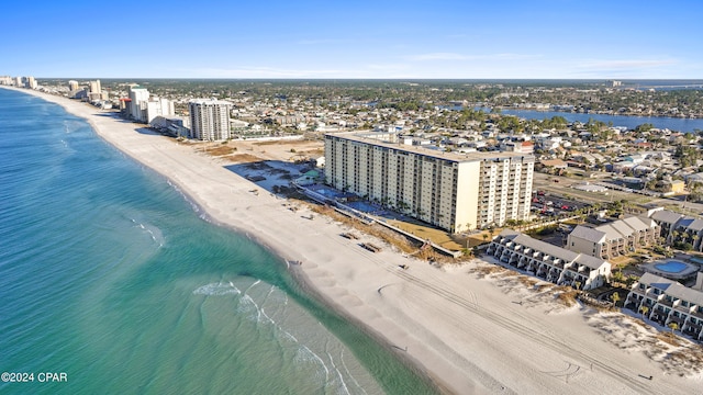 aerial view with a beach view and a water view