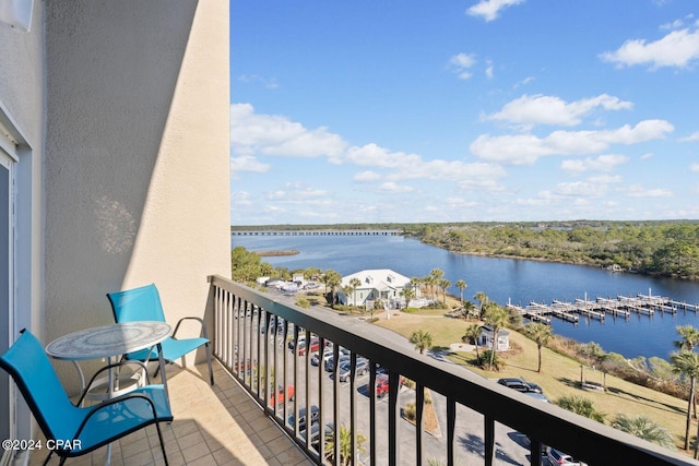 balcony featuring a water view