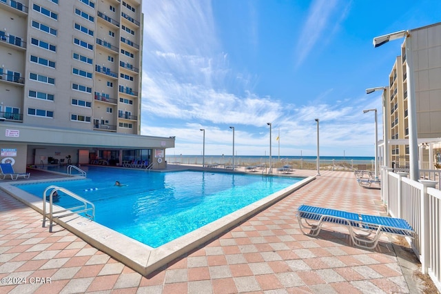 view of pool with a patio