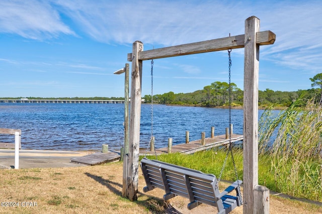 dock area featuring a water view