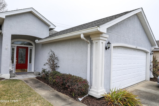 exterior space with a garage