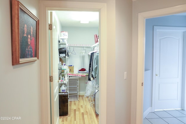 hallway with light tile floors