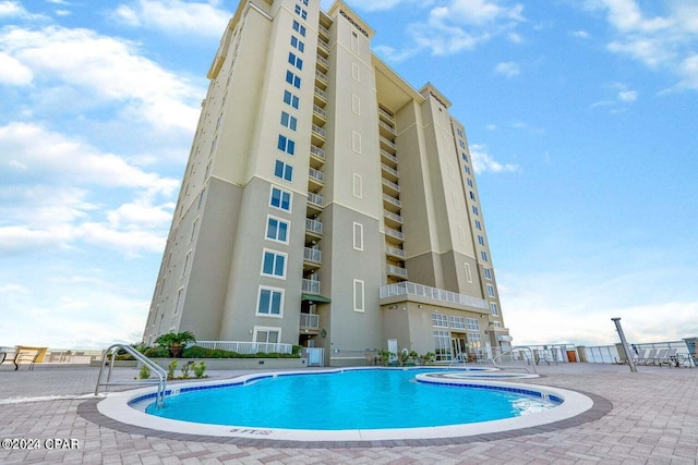 view of pool with a patio area