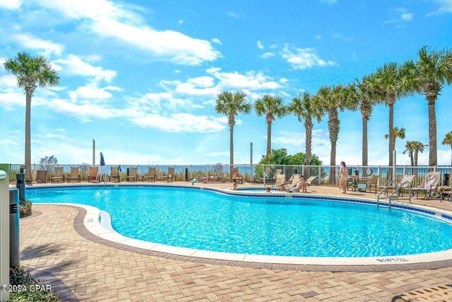 view of pool featuring a patio area