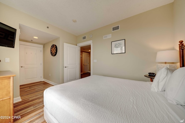 bedroom featuring light hardwood / wood-style flooring