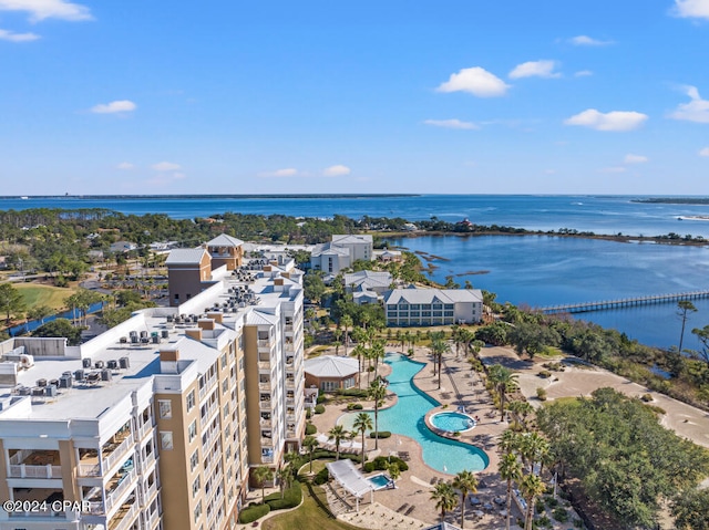 birds eye view of property with a water view