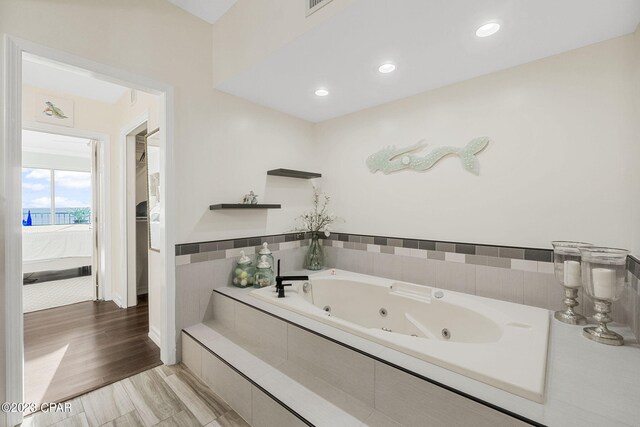 bathroom featuring hardwood / wood-style flooring