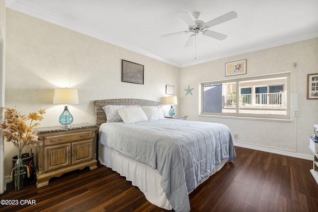 bedroom featuring ceiling fan, dark hardwood / wood-style floors, and crown molding