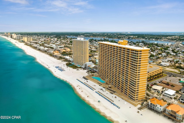 bird's eye view with a view of the beach and a water view