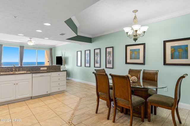 dining room featuring sink, crown molding, a textured ceiling, light tile patterned floors, and ceiling fan with notable chandelier