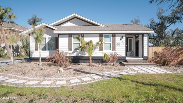 view of front of property with a front lawn