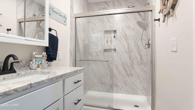 bathroom featuring vanity and walk in shower