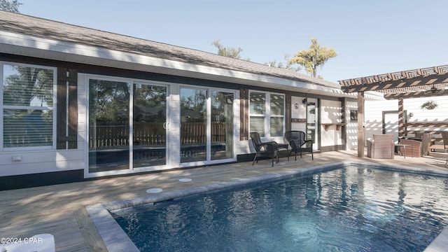 view of pool featuring a pergola and a patio