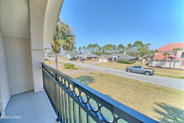 balcony featuring a residential view