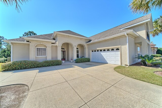 view of front of home with a garage