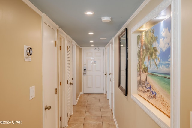 corridor featuring light tile patterned flooring