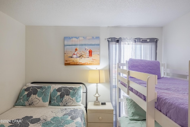 bedroom with a textured ceiling