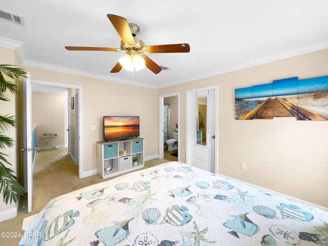 carpeted bedroom with connected bathroom, ornamental molding, and ceiling fan