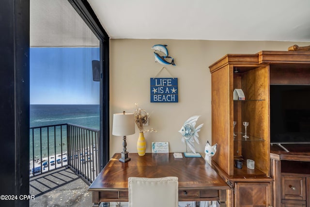 dining room with a water view