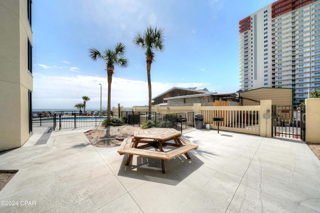 view of patio / terrace featuring a community pool