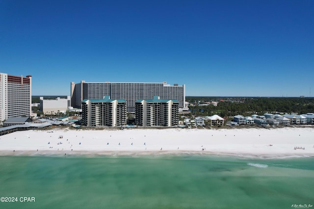 drone / aerial view with a view of the beach and a water view