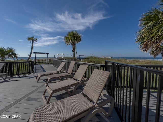 deck featuring a water view