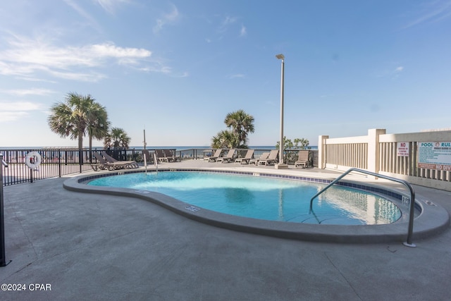 view of pool featuring a patio area